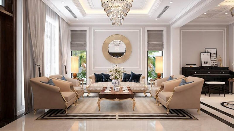 Bộ bàn ghế sofa tân cổ điển mạ vàng gam màu trắng sữa nhẹ nhàng nhưng lại tạo điểm nhấn đẹp, sang trọng cho phòng khách. Thiết kế nội thất phòng khách nhà phố