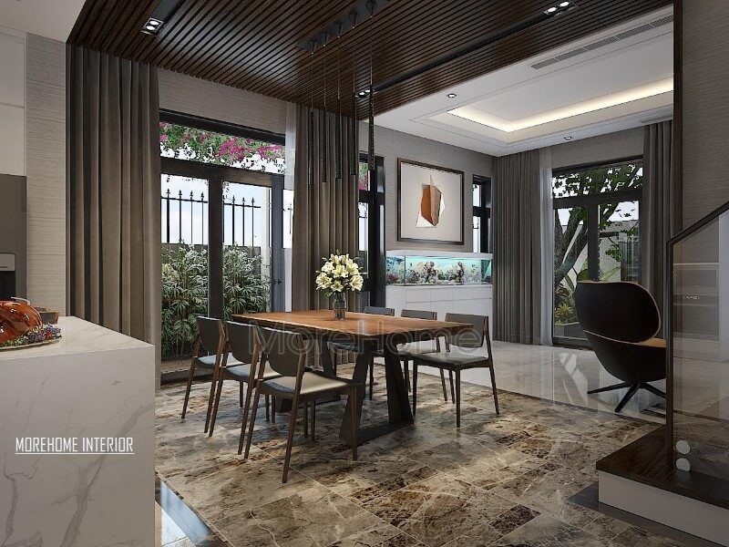 Phòng ăn hiện đại được thiết kế thông thoáng và hài hòa với thiên nhiên bằng cách sử dụng cửa lớn để cho ánh sáng lan tỏa tối đa nhưng vẫn có thể chắn nắng bằng rèm 2 lớp.